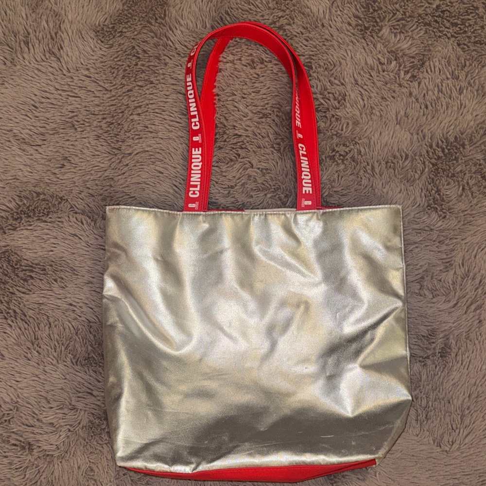 Clinique Metallic Silver Tote with Red Handles Candy Cane Interior Shoulder Bag - Picture 1 of 9